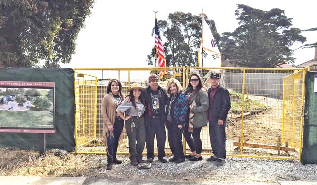 photo of Tony and family at site