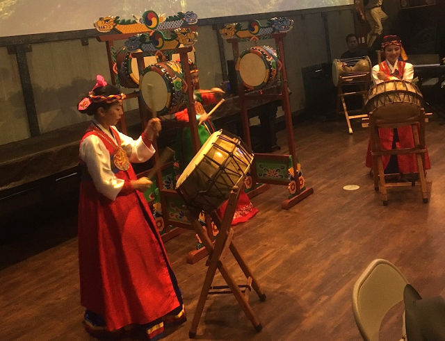 photo of traditional Korean drummers playing for the crowd